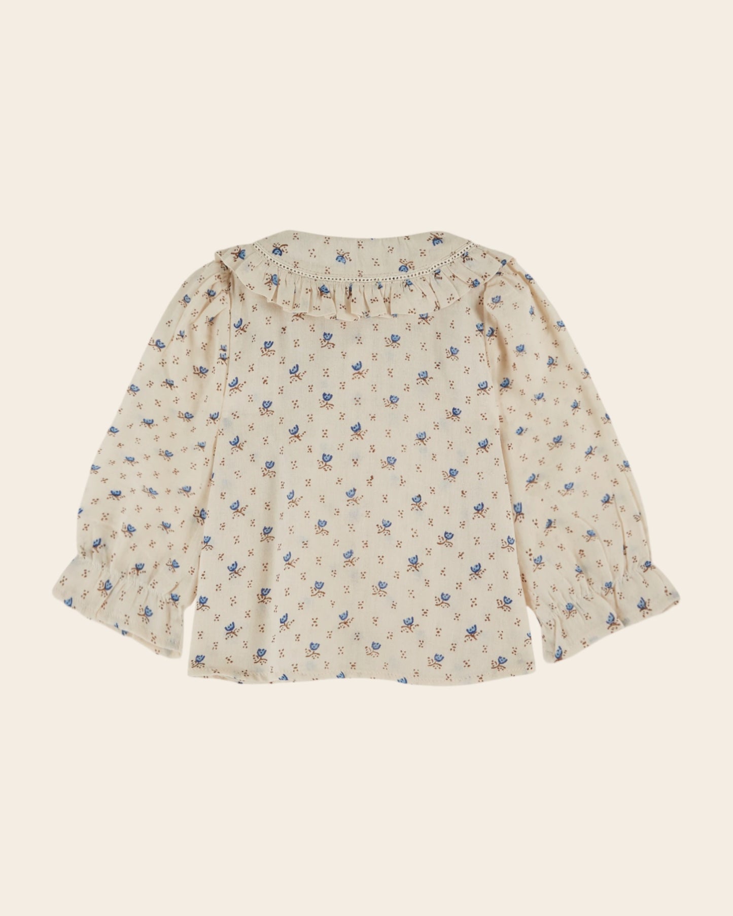 Blouse écrue à fleurs bleues