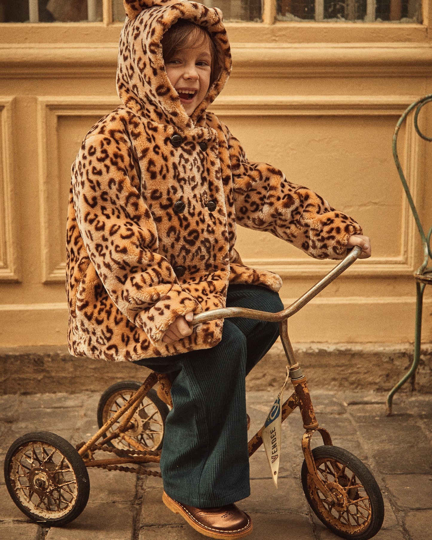 Veste 3/4 fausse fourrure léopard