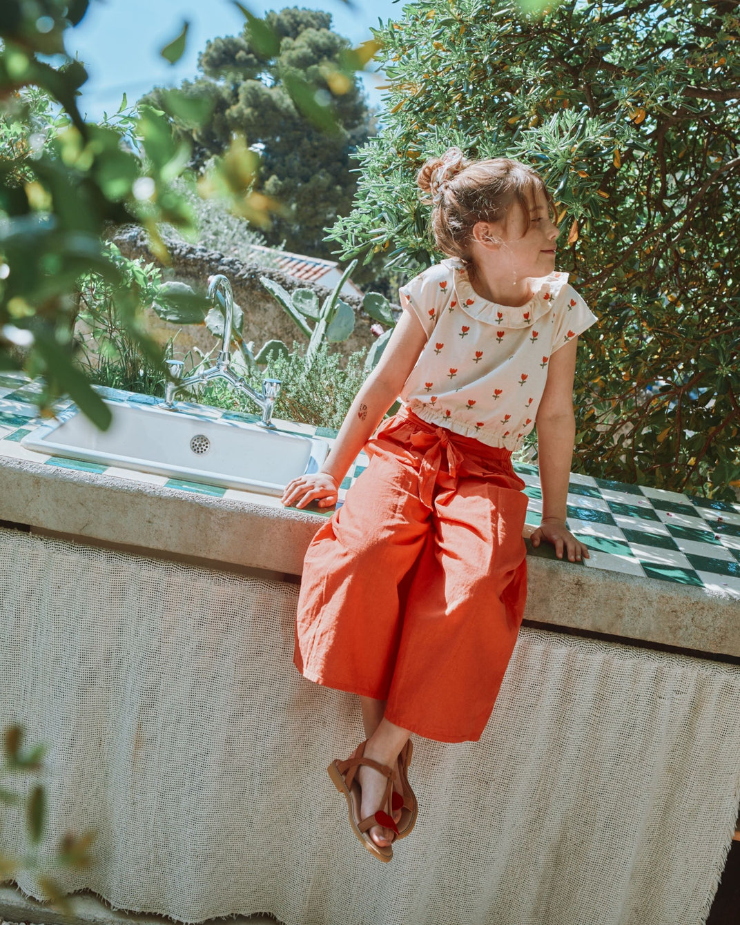 Orange linen and cotton knotted pants