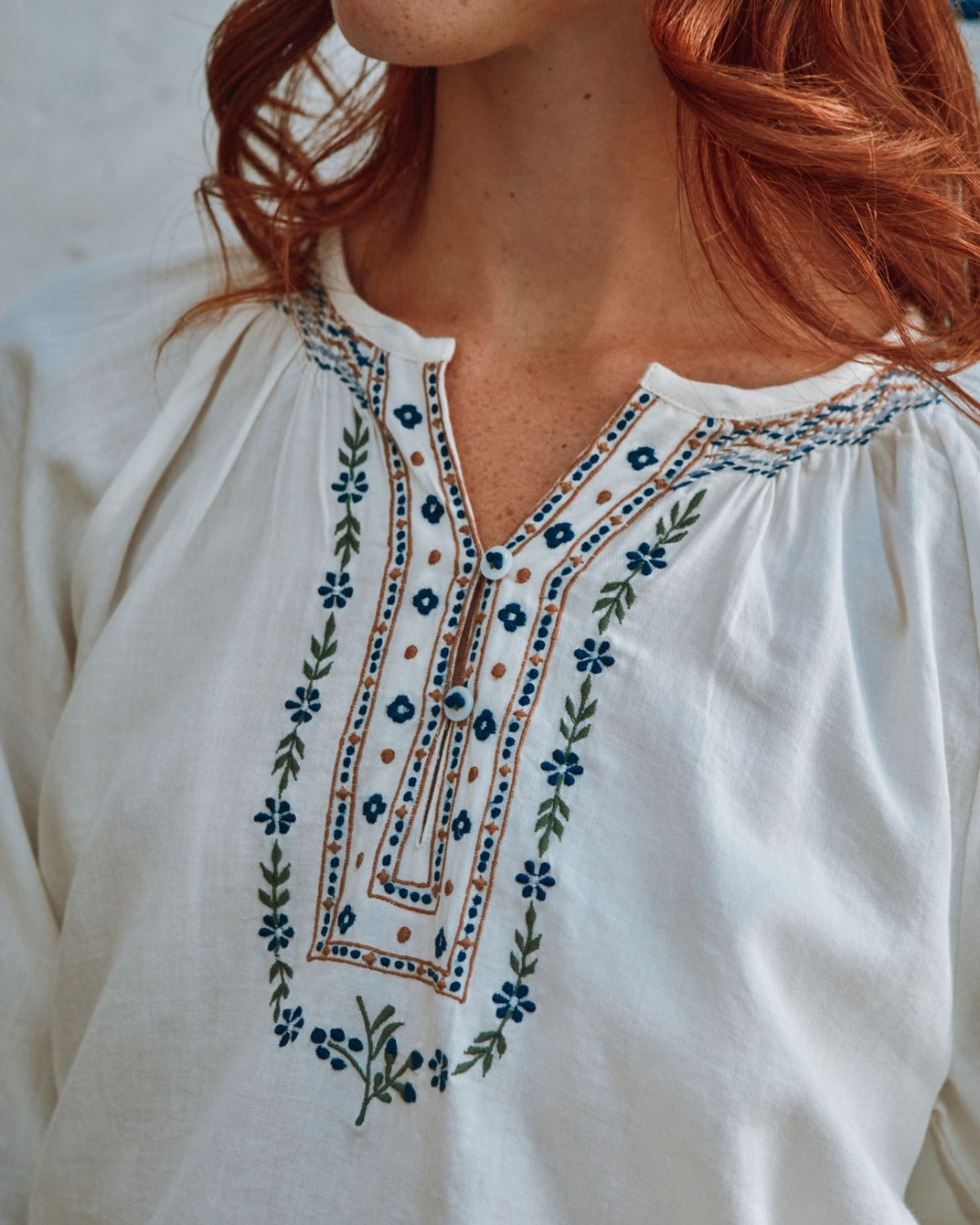 cream embroidered smocked blouse