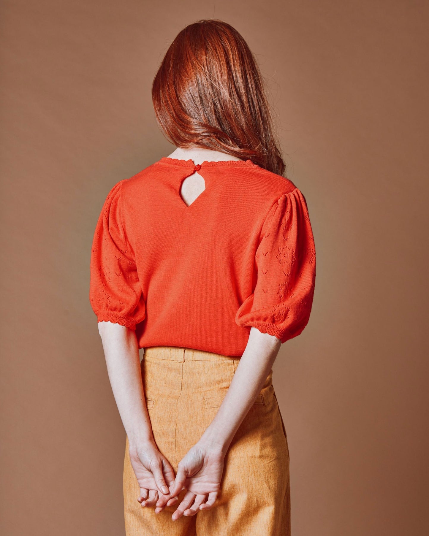 Pull - Ajouré noeud rouge