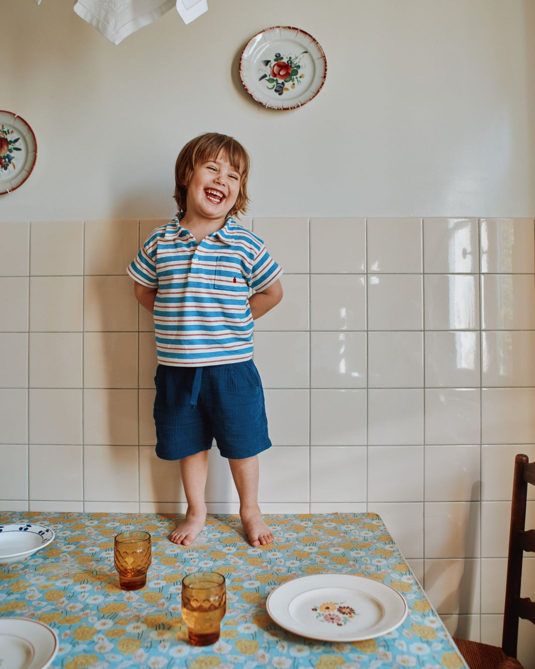 Organic cotton polo shirt with red and blue stripes