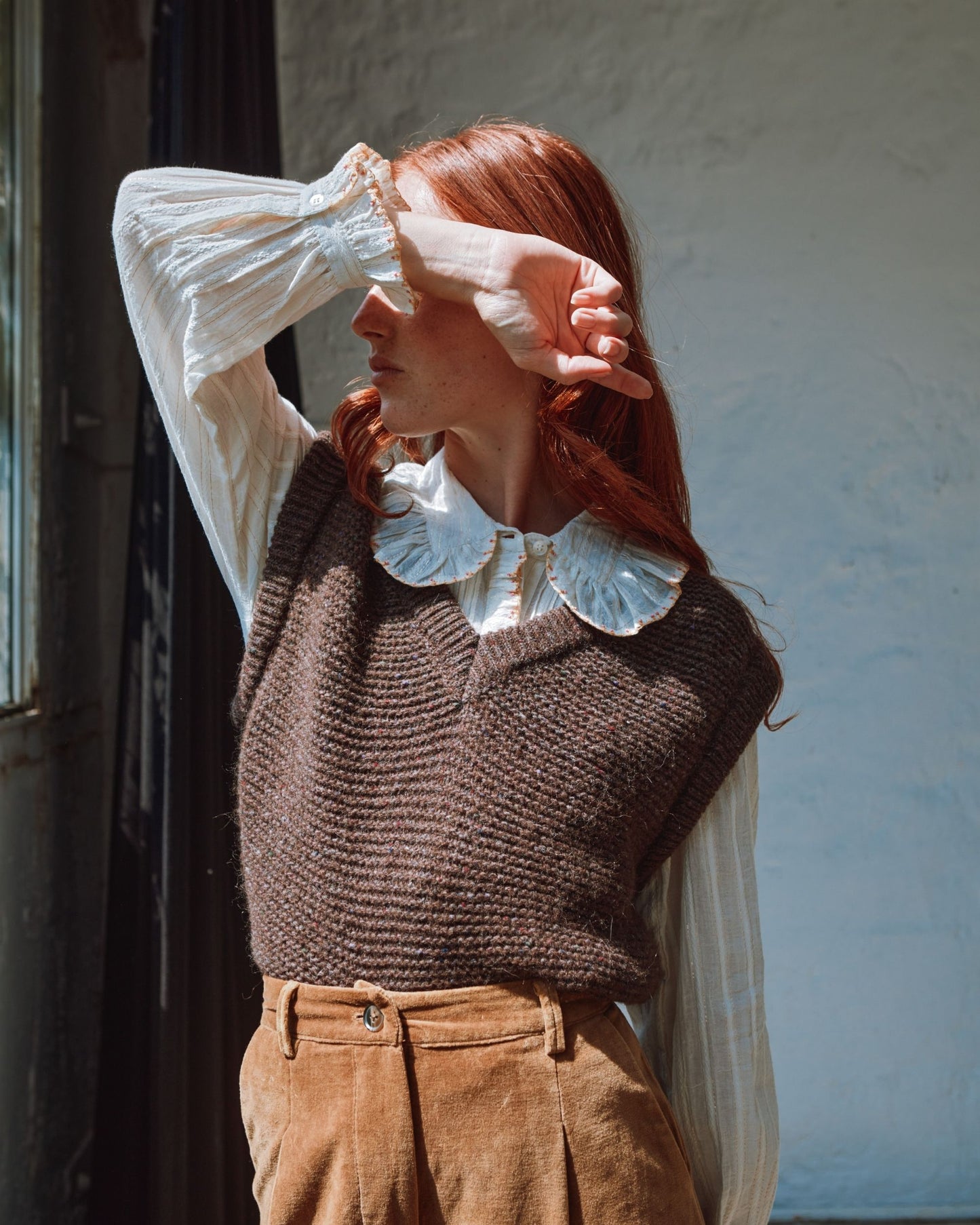 Brown sleeveless sweater