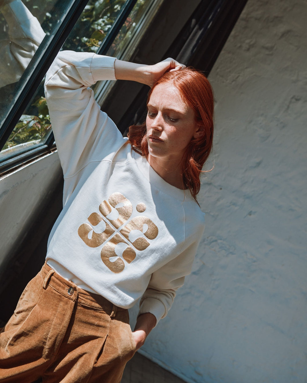 cream logo sweatshirt