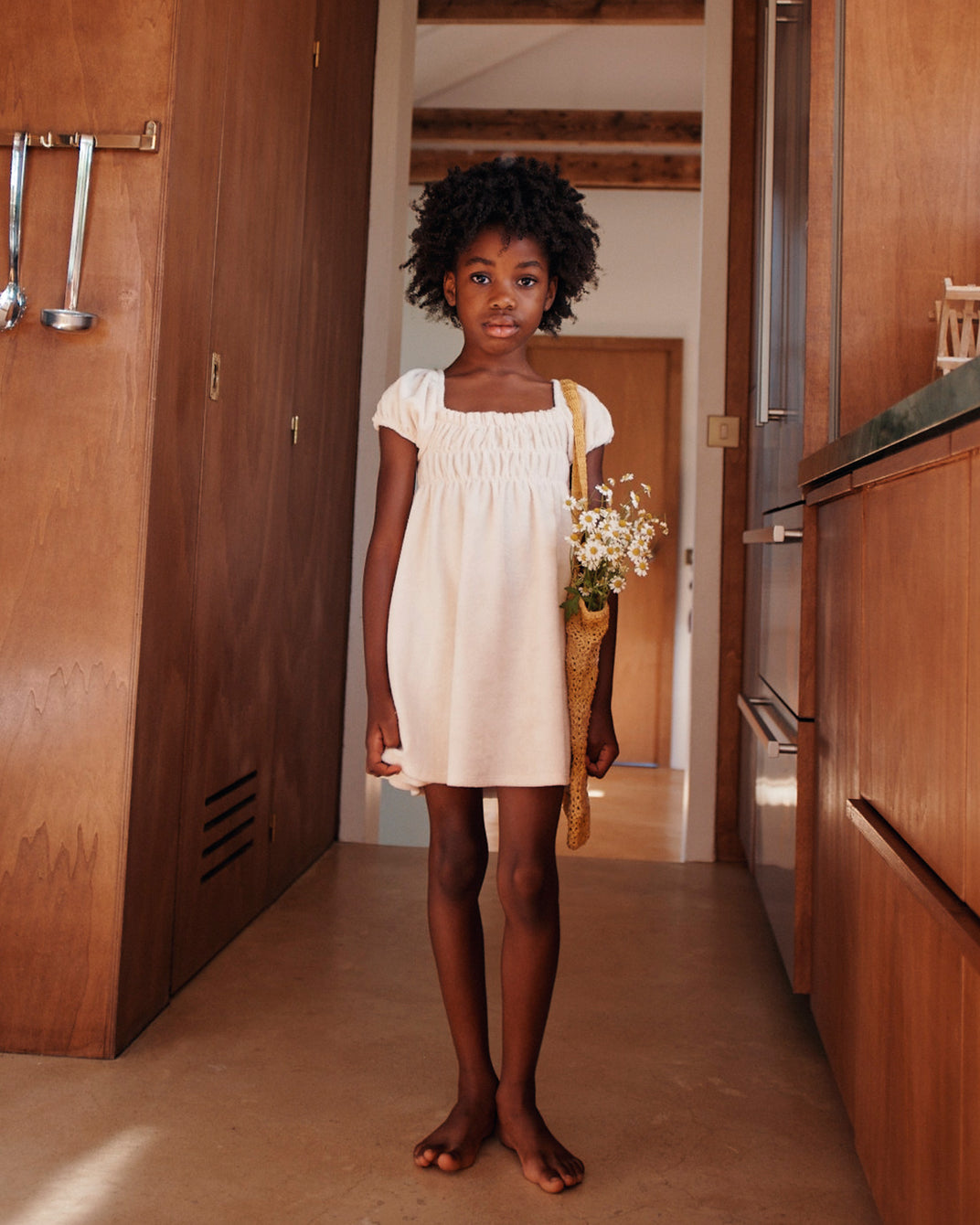 Cream smocked terrycloth dress