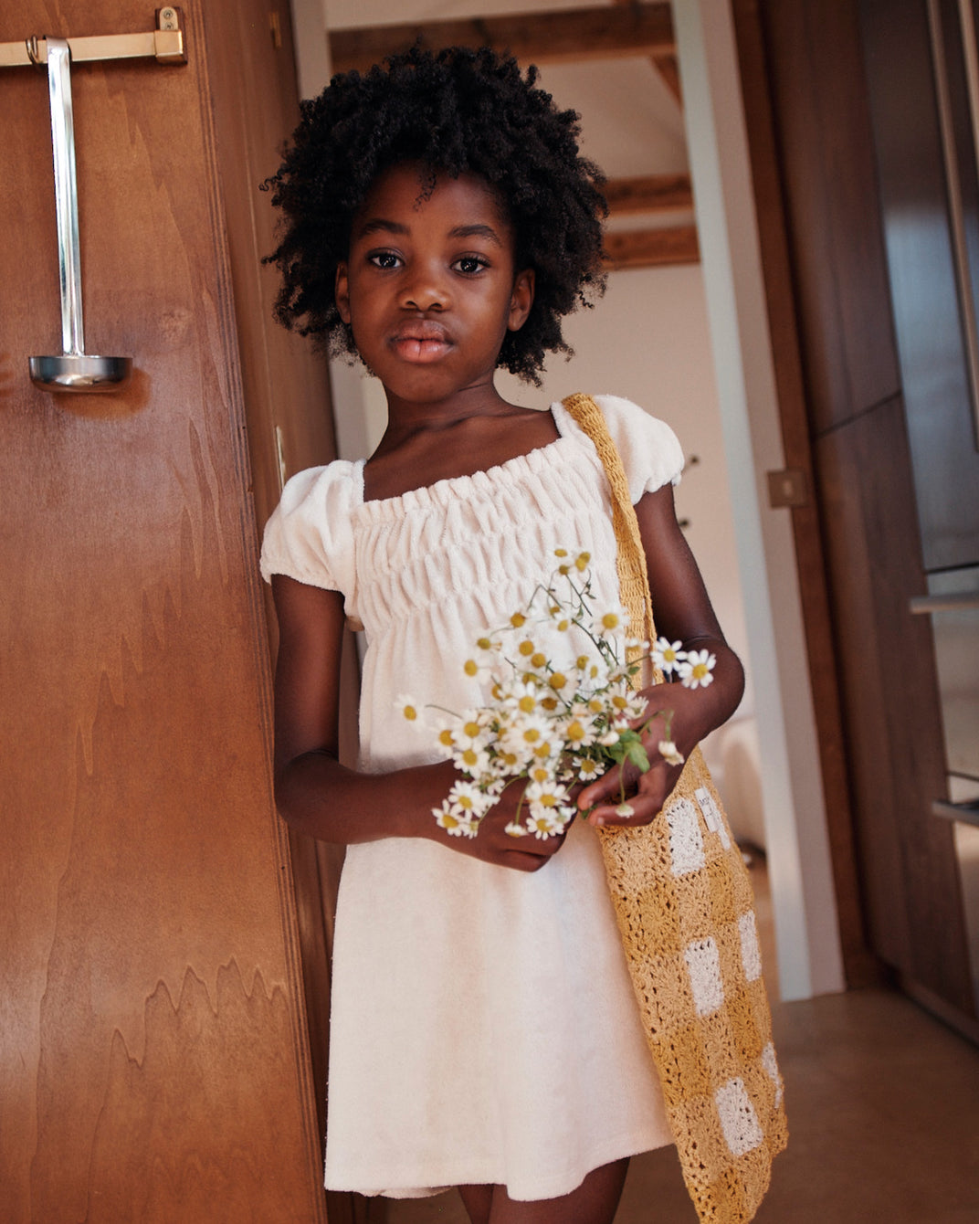 Cream smocked terrycloth dress