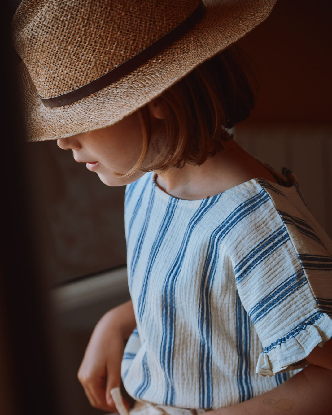 Blue and ecru striped blouse