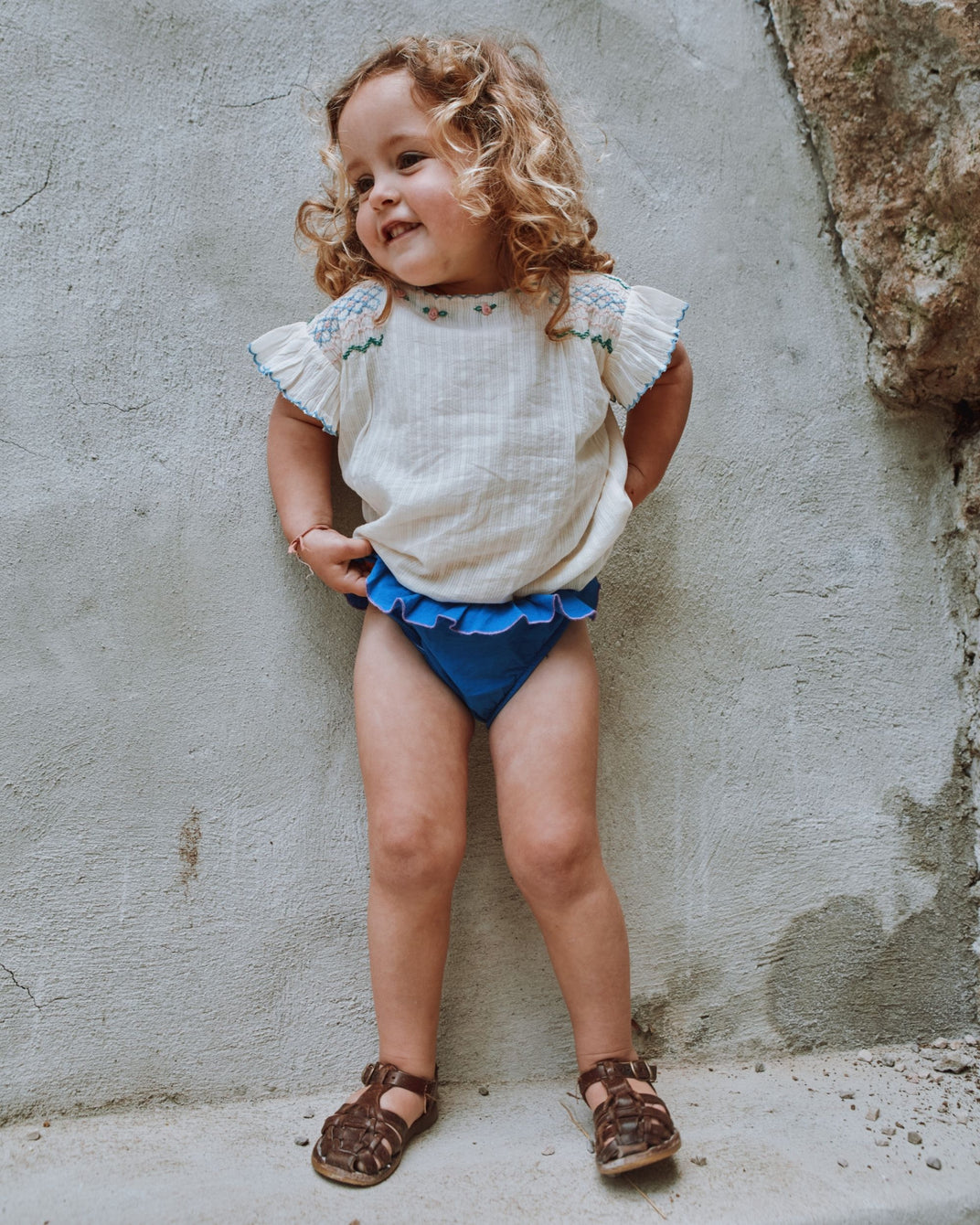 Ecru hand-smocked embroidered blouse