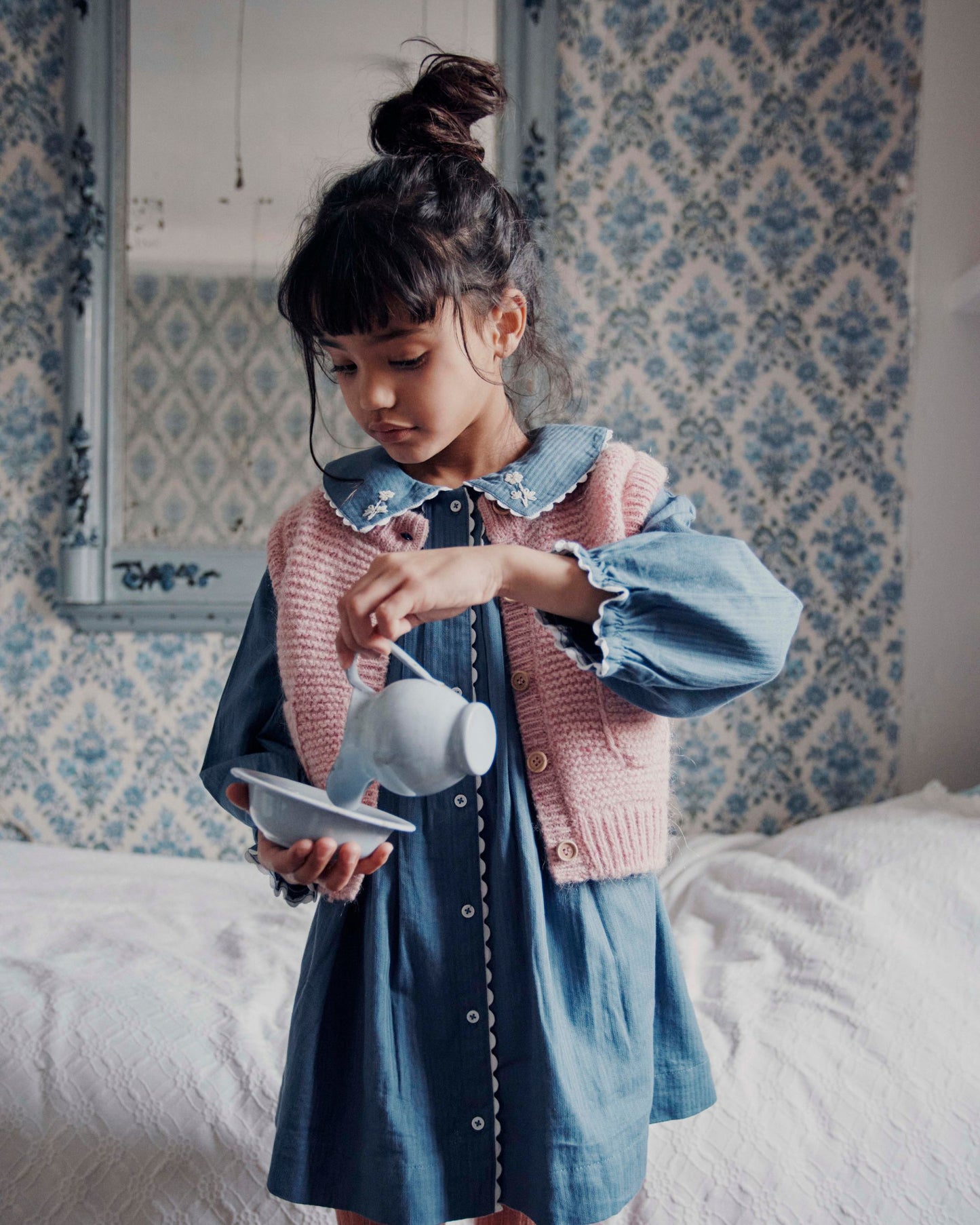 Cardigan sans manches rose pâle