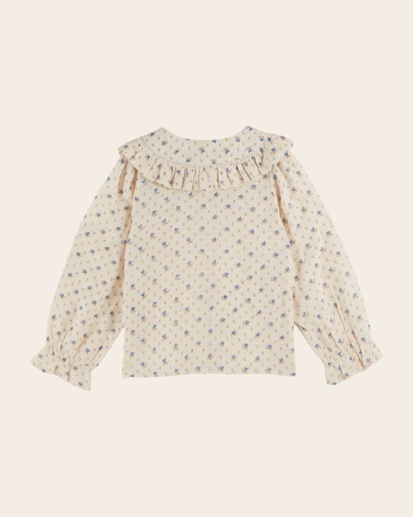 Blouse écrue à fleurs bleues