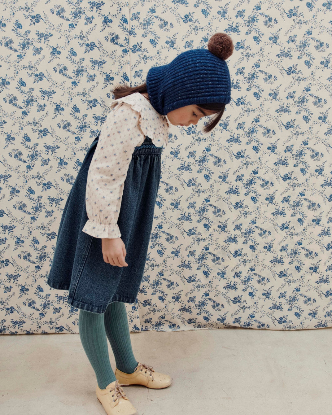 Cagoule pompom bleu