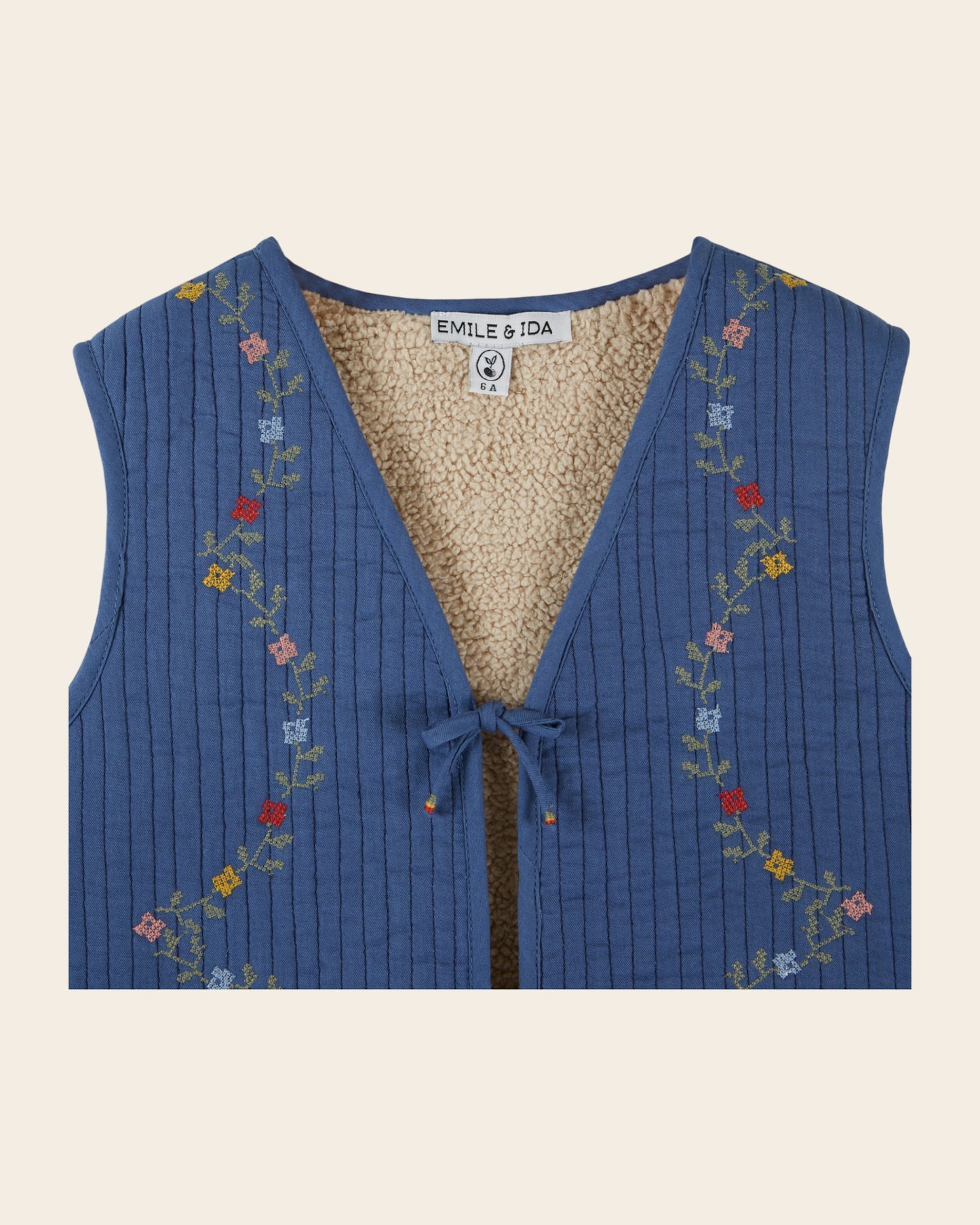 Veste sans manches - Matelassée brodée bleu