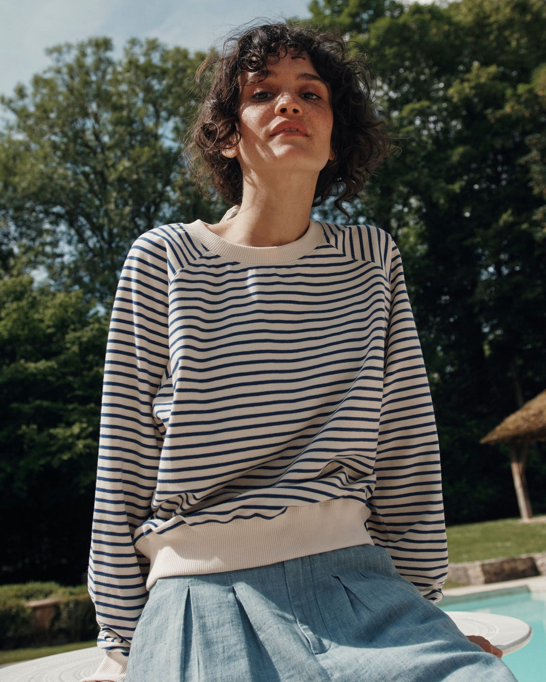 Women's organic cotton striped sweatshirt in navy blue