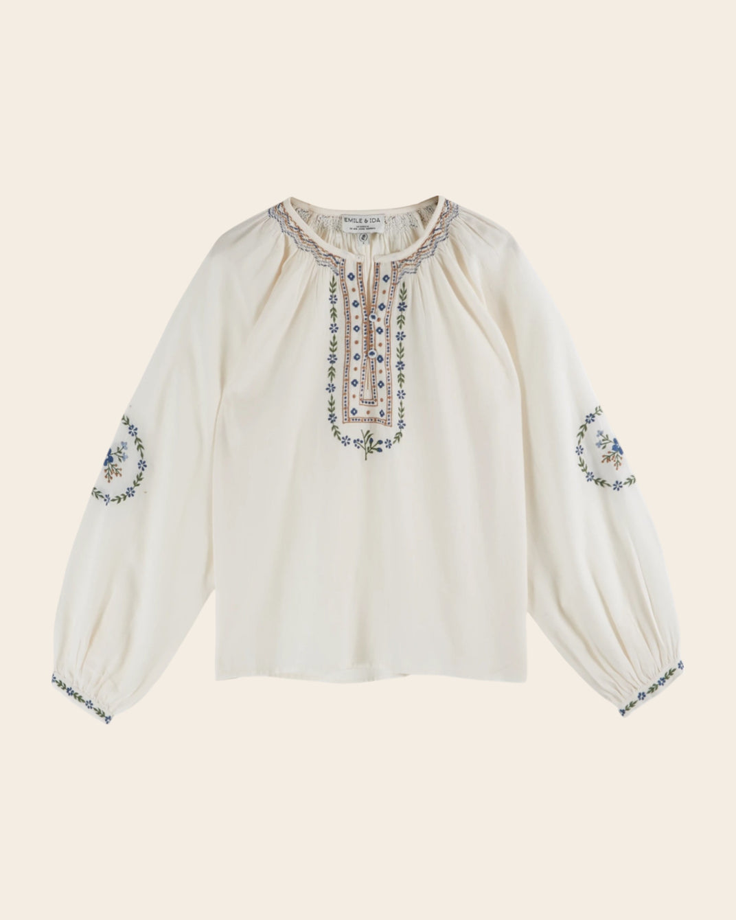 cream embroidered smocked blouse