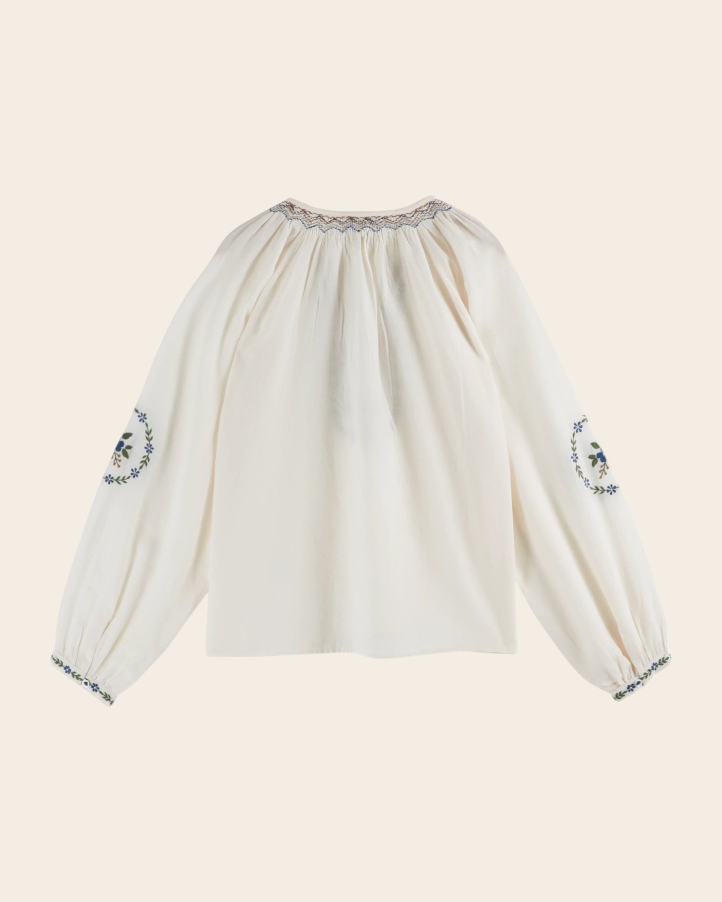 cream embroidered smocked blouse