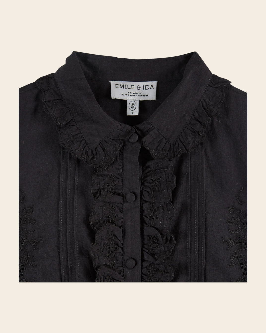 Blouse volantée broderie anglaise noir