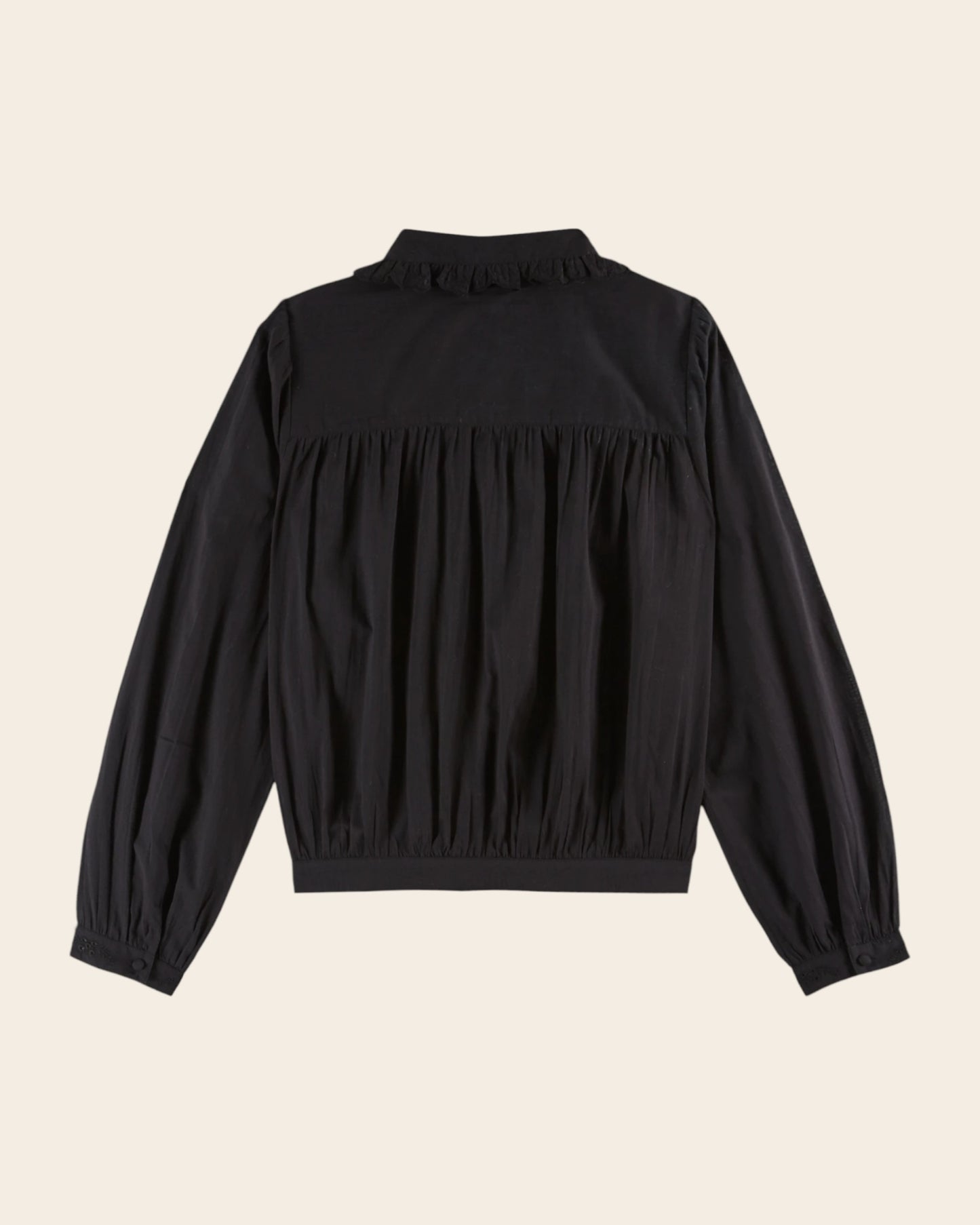 Blouse volantée broderie anglaise noir