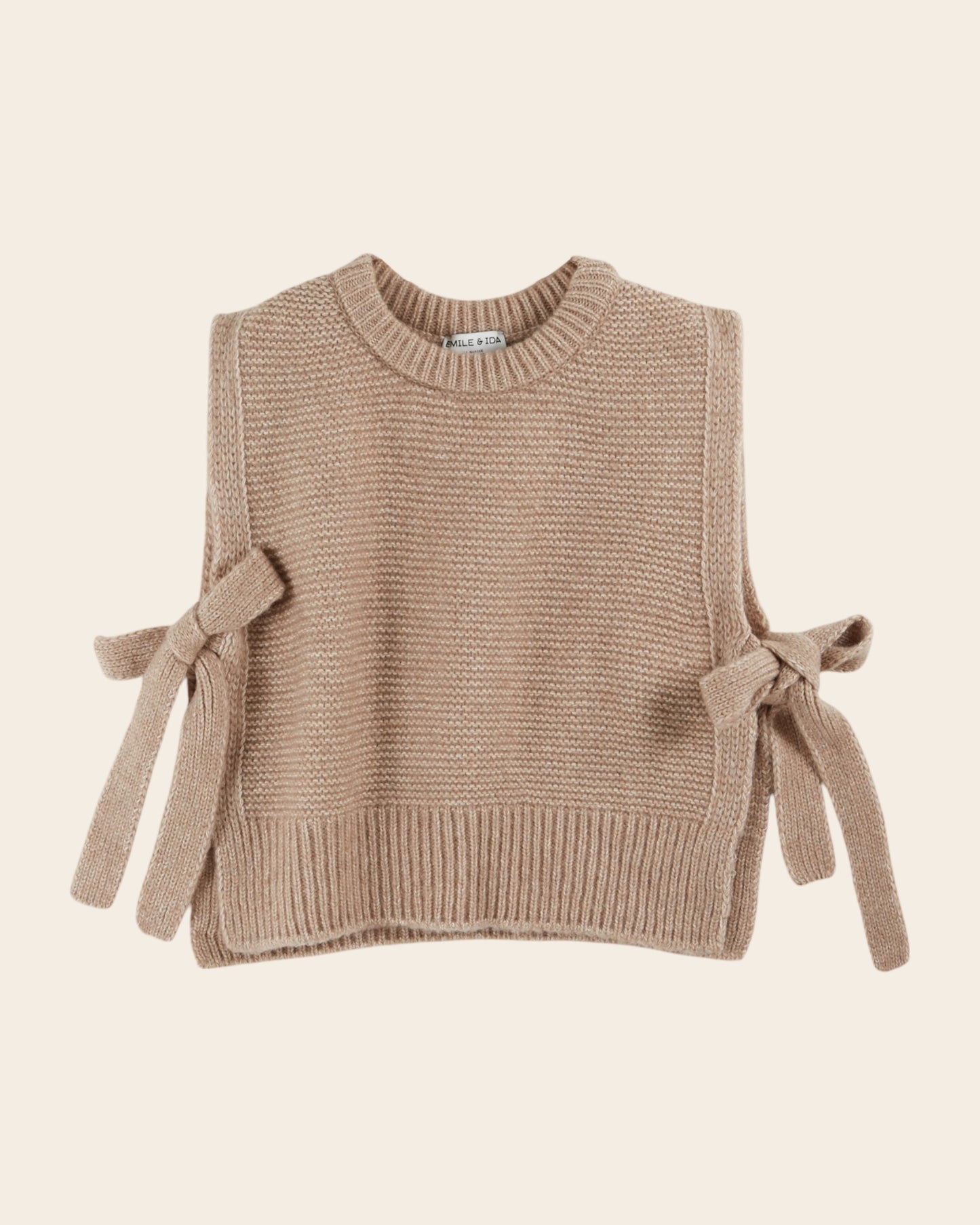 beige sleeveless tie-up sweater