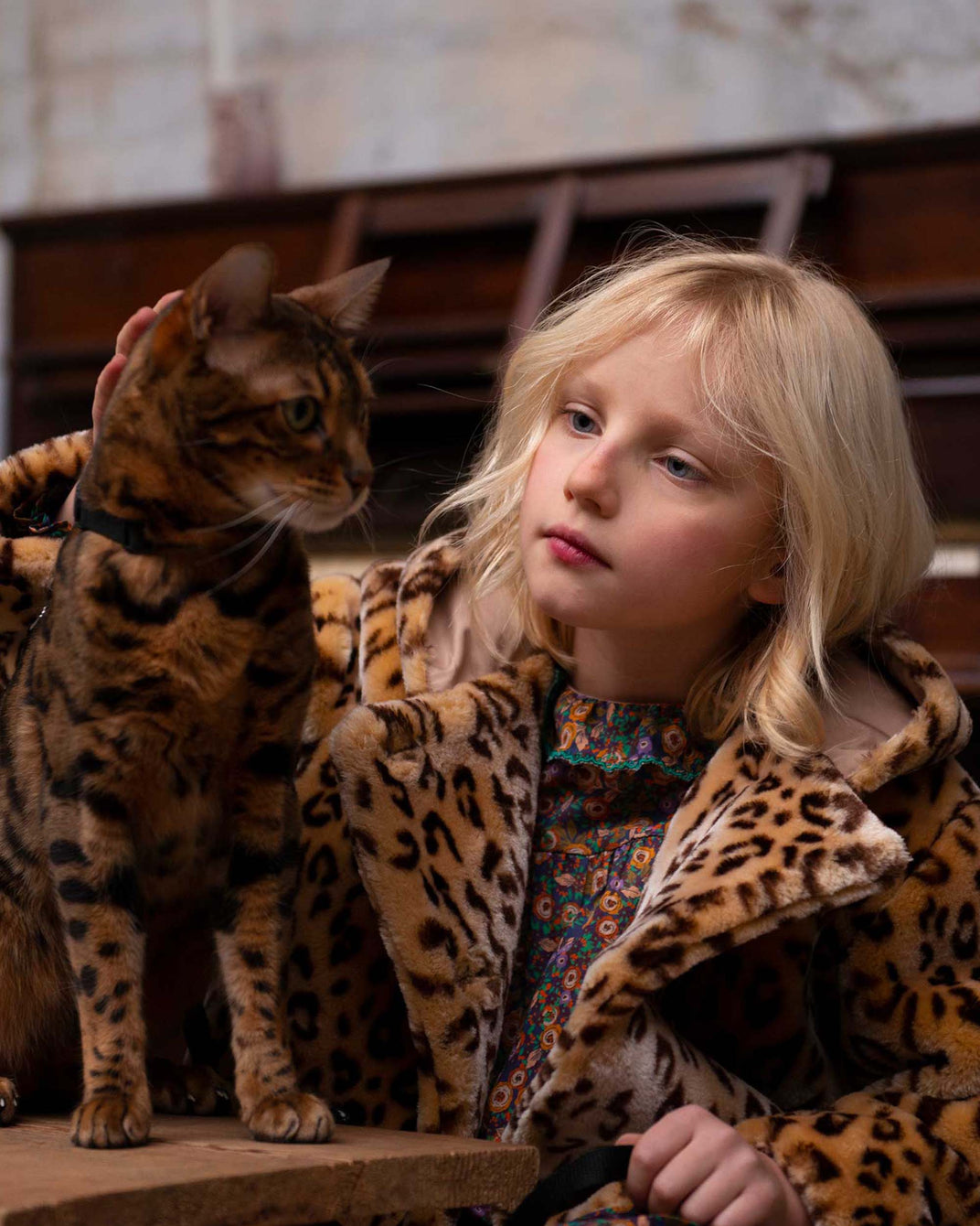 Veste 3/4 fausse fourrure léopard